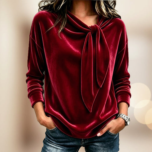 Solid color long sleeved bow top