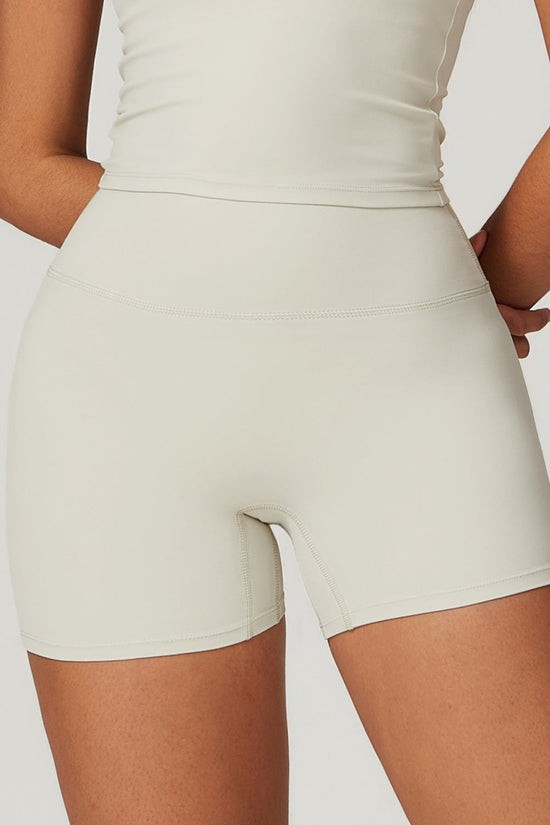 Shaved tight yoga shorts for women, high waisted and waist cinching fitness pants, hip lifting and running sports shorts 
