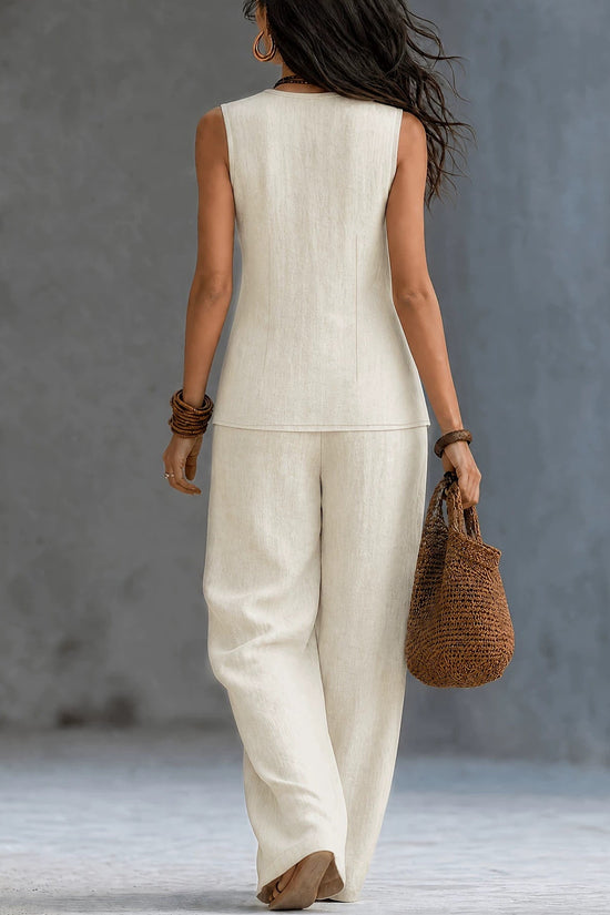 Sleeveless V-neck waist cinched top paired with wide leg pants set 