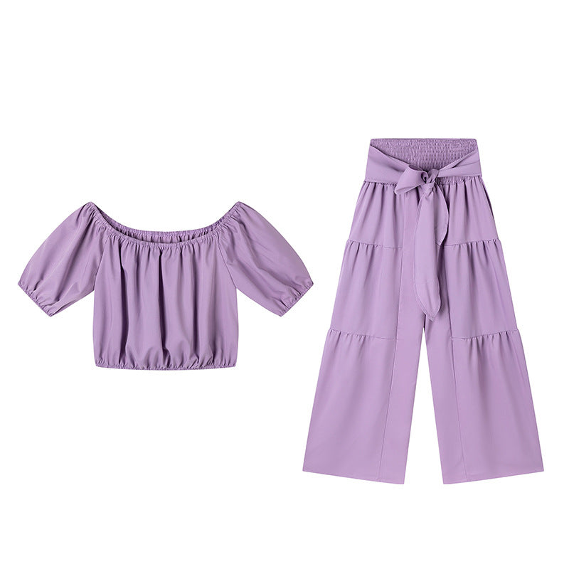 High-waisted Solid-color Flared Pants With Tie Detailing And A Flowing Drape 