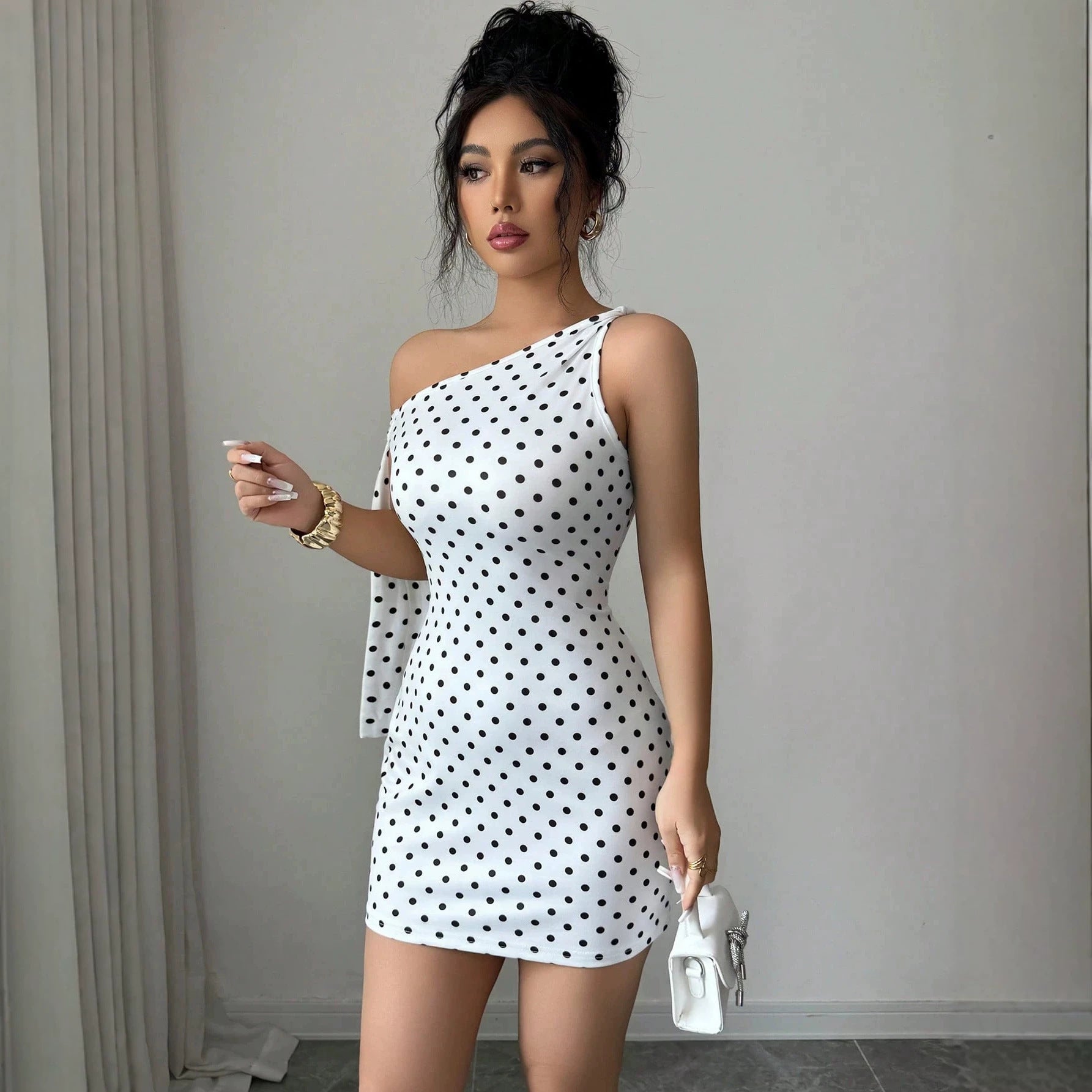 Wave point sloping shoulder strap slim fit hip hugging jumpsuit short skirt for women 
