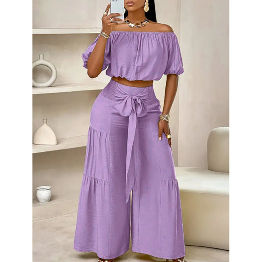 High-waisted Solid-color Flared Pants With Tie Detailing And A Flowing Drape 