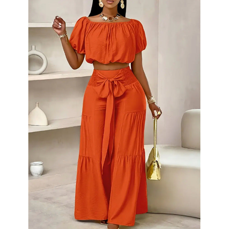 High-waisted Solid-color Flared Pants With Tie Detailing And A Flowing Drape 