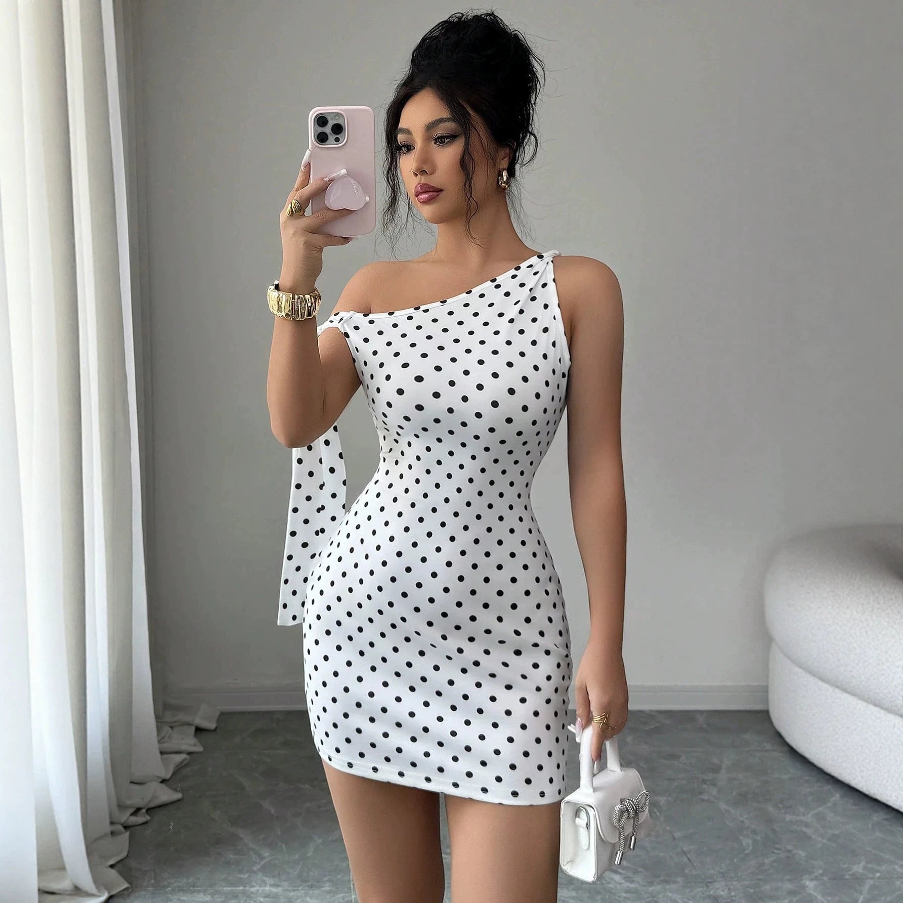 Wave point sloping shoulder strap slim fit hip hugging jumpsuit short skirt for women 