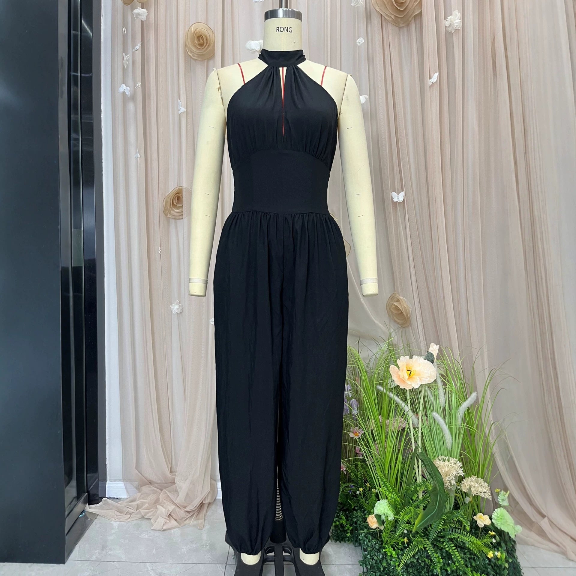 Sleeveless hanging neck backless high waisted jumpsuit 