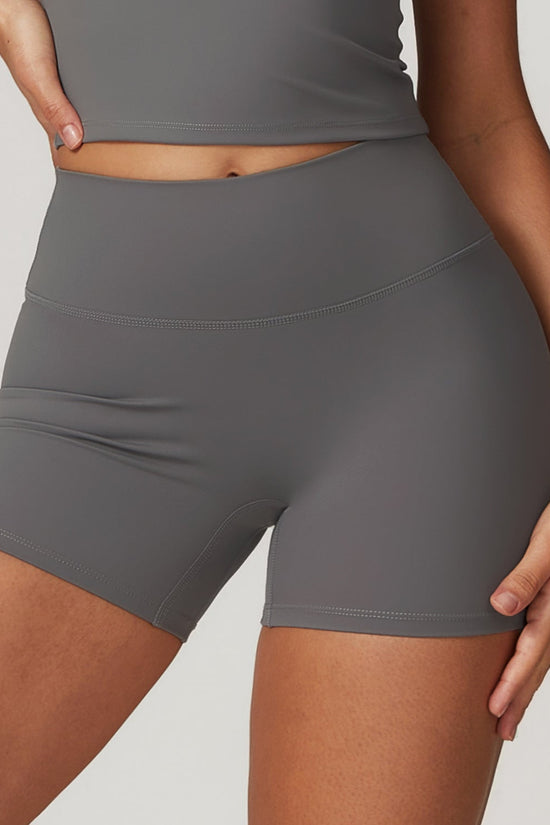 Shaved tight yoga shorts for women, high waisted and waist cinching fitness pants, hip lifting and running sports shorts 